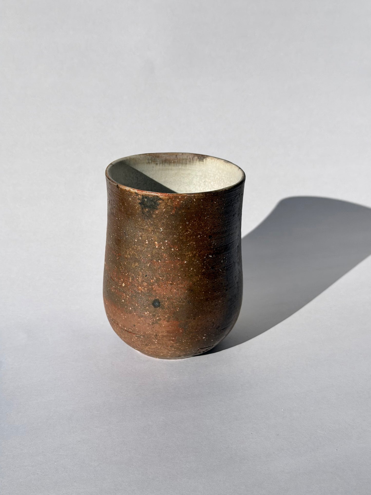 Wood fired tumbler