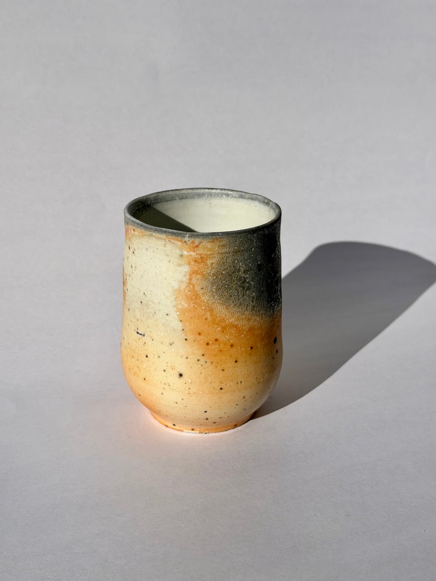 Wood fired tumbler