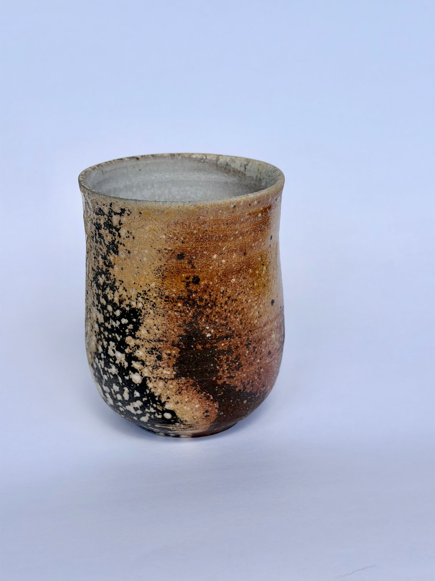 Wood fired tumbler